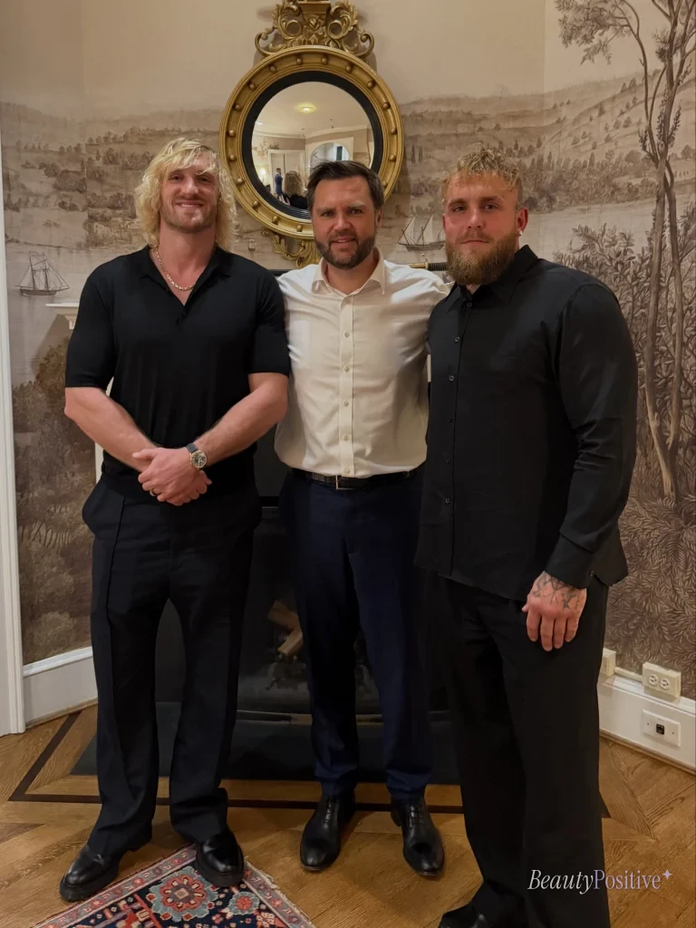Jake Paul with Logan Paul and Nakisa Bidarian in suits