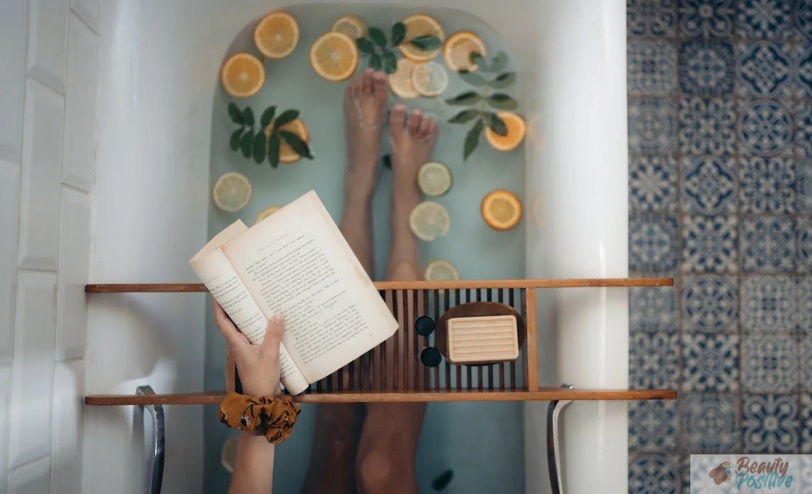 Girl reading in her bath