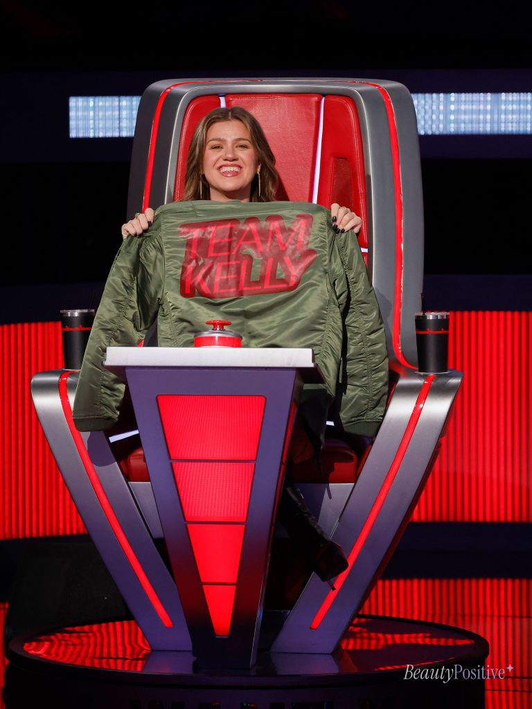 Kelly Clarkson in her coach's chair on The Voice, from her Instagram