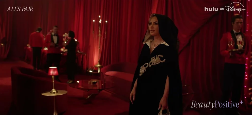 Allura in the scorpion-trimmed velvet hood, from the All's Fair Season 2 trailer.