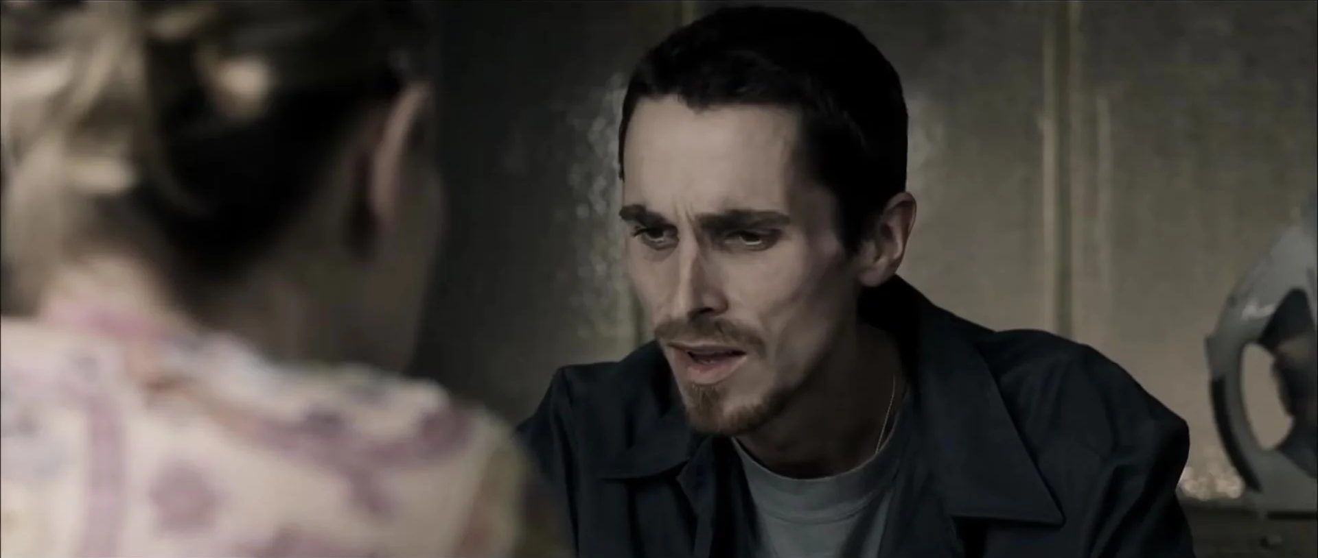 Christian Bale as Trevor Reznik with Jennifer Jason Leigh in The Machinist, 2004