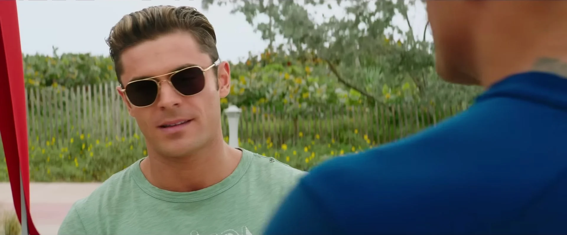 Zac Efron as Matt Brody on the beach in Baywatch, official trailer, March 2017