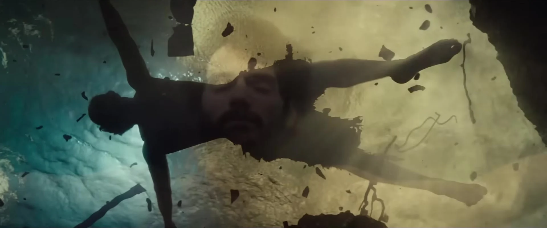 Henry Cavill floating underwater in the Man of Steel trailer, December 2012