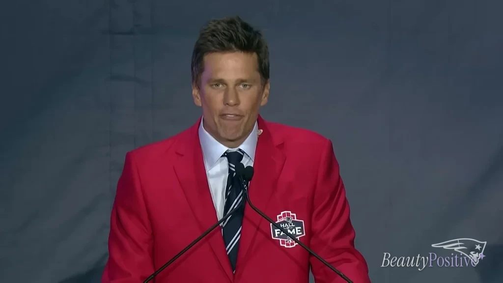 In the red jacket: Brady's Patriots Hall of Fame speech, June 12, 2024.