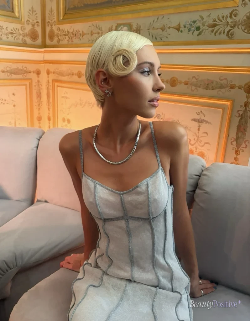 Iris Law in Louis Vuitton at a Business of Fashion event in early October, in a photo she posted