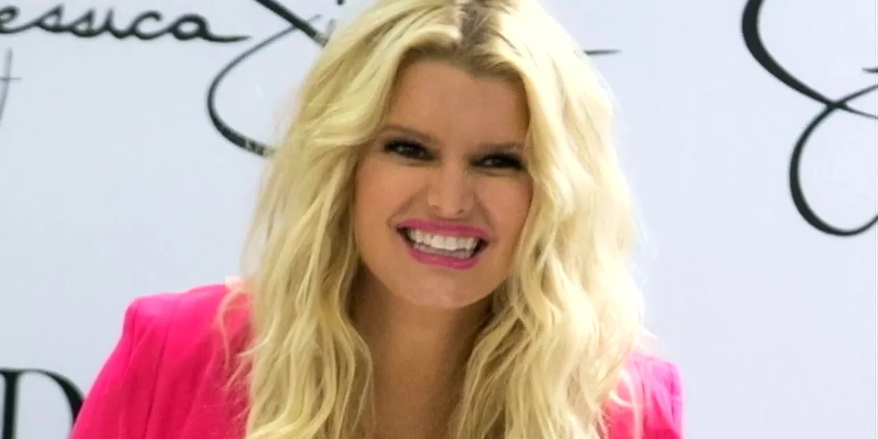 Jessica Simpson in a pink blazer at a Jessica Simpson Collection event, in an ABC News report on her Weight Watchers weight loss, November 2012