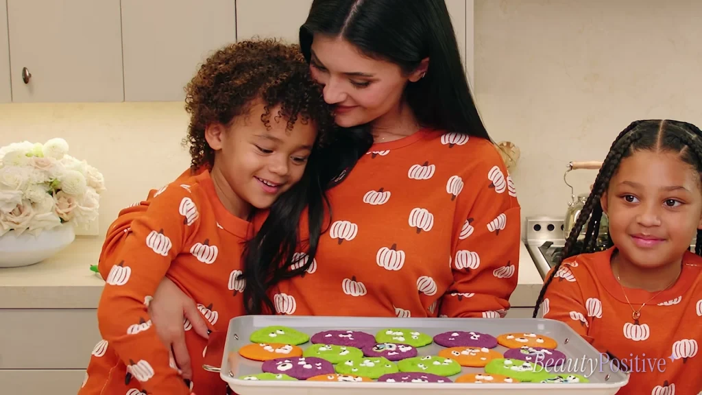 Kylie Jenner and Stormi with a tray of Halloween cookies