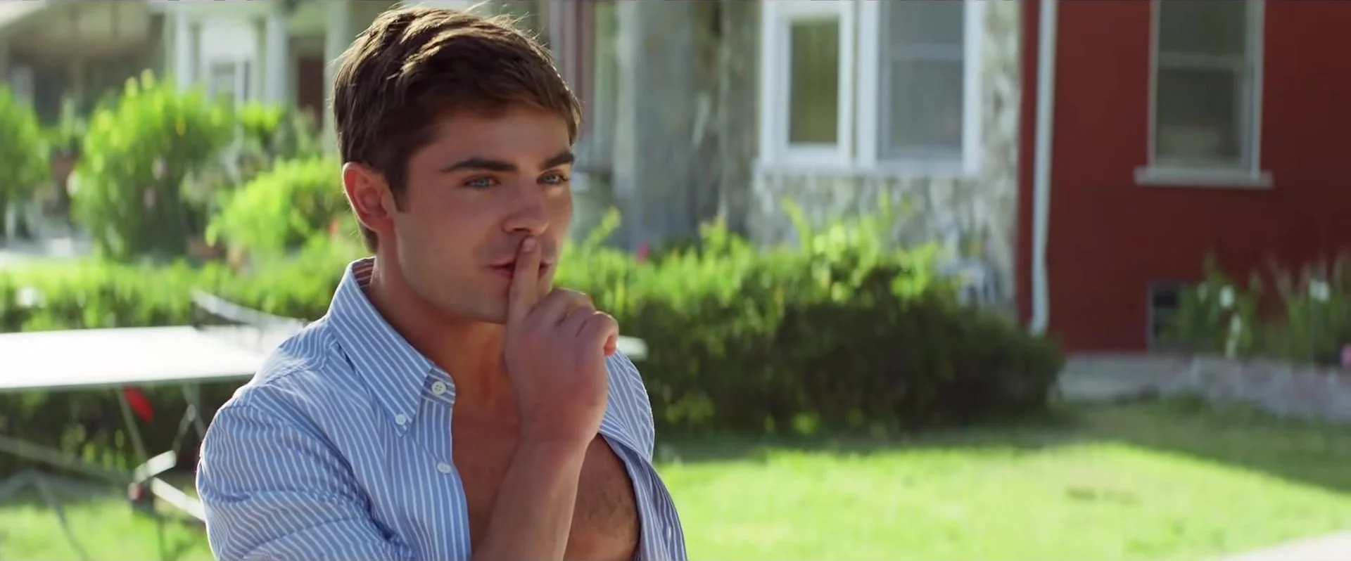 Zac Efron as Teddy Sanders outside the fraternity house in Neighbors, theatrical trailer, December 2013