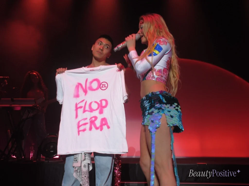 Zara Larsson on stage in Tokyo in October 2026, a year after asking whether the hackers were still logged in.
